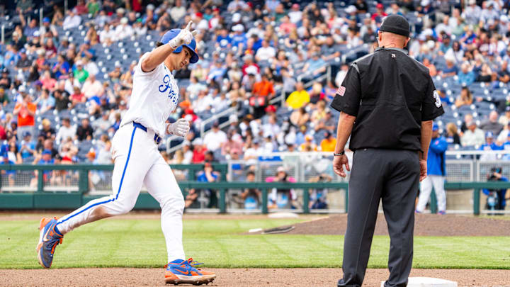Jun 19, 2024; Omaha, NE, USA; Florida Gators first baseman Jac Caglianone (14) celebrates after hitting a home run against the Kentucky Wildcats during the sixth inning at Charles Schwab Field Omaha. The 75th home run of his career, Caglianone breaks the Florida all-time home run record previously held by Matt LaPorta. Mandatory Credit: Dylan Widger-Imagn Images