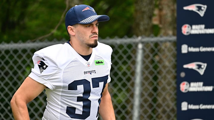 Jun 9, 2025; Foxborough, MA, USA; New England Patriots place kicker John Parker Romo (37) walks to the practice fields at Gillette Stadium. Mandatory Credit: Eric Canha-Imagn Images