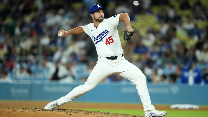 May 7, 2024; Los Angeles, California, USA; Los Angeles Dodgers pitcher J.P. Feyereisen (45) throws in the ninth inning against the Miami Marlins at Dodger Stadium. Mandatory Credit: Kirby Lee-Imagn Images