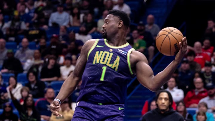 Feb 12, 2025; New Orleans, Louisiana, USA;  New Orleans Pelicans forward Zion Williamson (1) leaps to pass a ball back inbounds against the Sacramento Kings during the first half at Smoothie King Center. Mandatory Credit: Stephen Lew-Imagn Images
