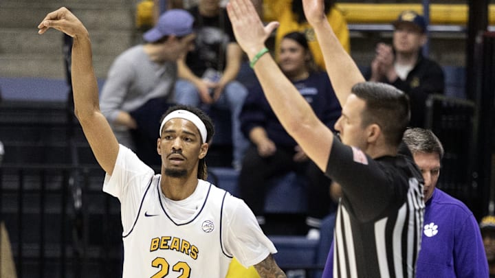 Feb 7, 2026; Berkeley, California, USA; California Golden Bears forward Chris Bell (22) celebrates his three-point basket against the Clemson Tigers during the first half at Haas Pavilion. Mandatory Credit: D. Ross Cameron-Imagn Images