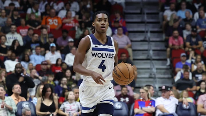 Oct 11, 2024; Des Moines, Iowa, USA; Minnesota Timberwolves guard Rob Dillingham (4) sets the offense against the Philadelphia 76ers at Wells Fargo Arena. The Timberwolves beat the 76ers 121 to 111.  Mandatory Credit: Reese Strickland-Imagn Images