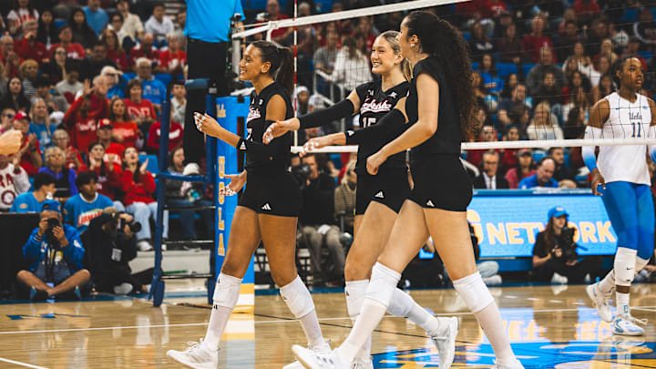 Nebraska players celebrate a point at UCLA Friday night. The Huskers lost a set for the first time in Big Ten play, but remained undefeated. Nebraska players celebrate a point at UCLA Friday night. The Huskers lost a set for the first time in Big Ten play, but remained undefeated.