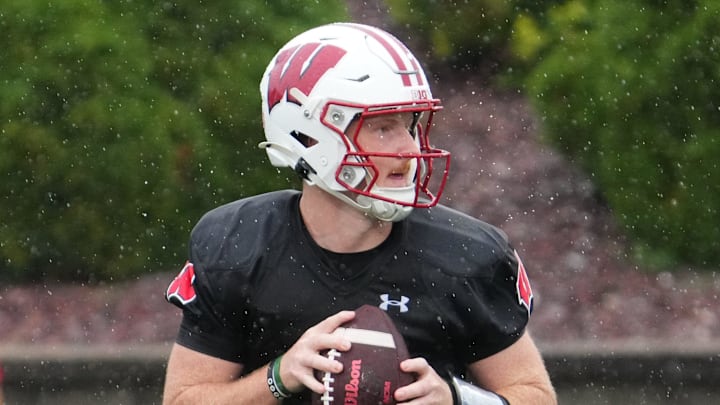 Wisconsin quarterback Billy Edwards Jr. (9) drops back to pass during football practice, July 30, 2025, at Ralph E. Davis Pioneer Stadium in Platteville, Wisconsin.