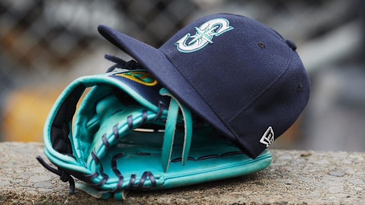 May 12, 2018; Detroit, MI, USA; Hat and glove of Seattle Mariners center fielder Dee Gordon (9) sits in dugout during the third inning against the Detroit Tigers at Comerica Park. Mandatory Credit: Rick Osentoski-Imagn Images
