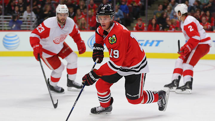 Sep 22, 2015; Chicago, IL, USA; Chicago Blackhawks center Jonathan Toews (19) with the puck during the second period against the Detroit Red Wings at the United Center. Mandatory Credit: Dennis Wierzbicki-Imagn Images