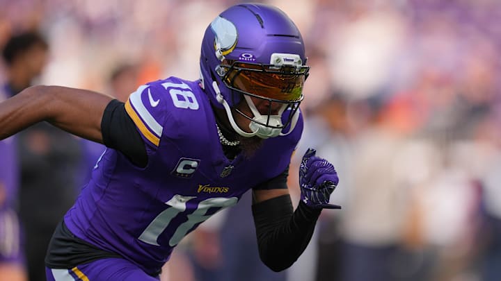 Nov 16, 2025; Minneapolis, Minnesota, USA; Minnesota Vikings wide receiver Justin Jefferson (18) warms up before a game against the Chicago Bears at U.S. Bank Stadium.