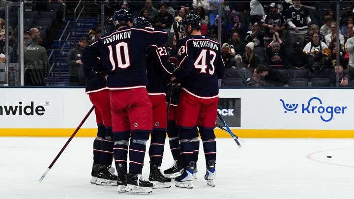 Sep 24, 2026; Columbus, Ohio, USA;  Columbus Blue Jackets defenseman Zach Werenski (8) celebrates with teammates after scoring a goal against the Pittsburgh Penguins in the first period at Nationwide Arena. Mandatory Credit: Aaron Doster-Imagn Images