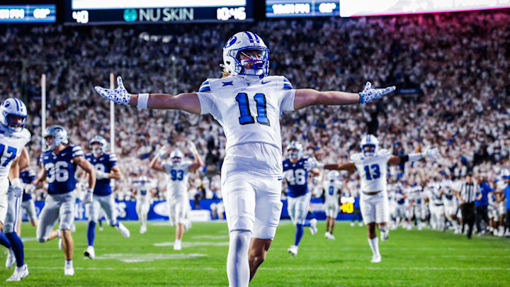 BYU punt returner Parker Kingston returns a punt for a touchdown against Kansas State