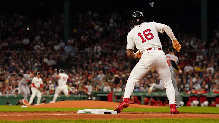 Sep 11, 2024; Boston, Massachusetts, USA; Boston Red Sox center fielder Jarren Duran (16) scores on a on a throwing error to first base against the Baltimore Orioles in the third inning at Fenway Park. Mandatory Credit: David Butler II-Imagn Images