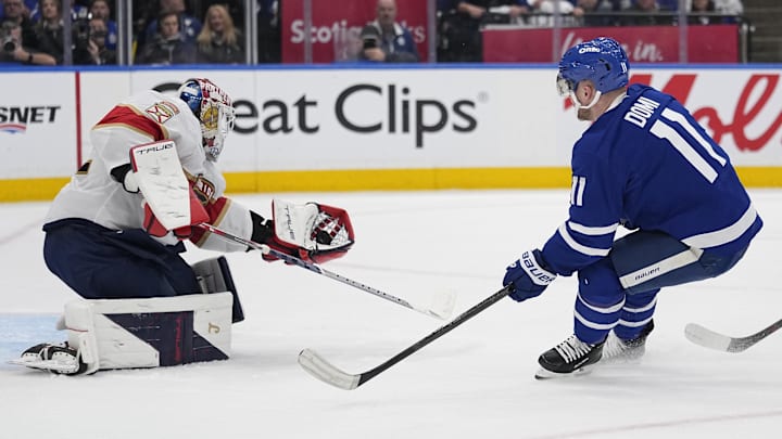 May 5, 2025; Toronto, Ontario, CAN; Florida Panthers goaltender Sergei Bobrovsky (72) makes a save against Toronto Maple Leafs forward Max Domi (11) during the third period of the second round of the 2025 Stanley Cup Playoffs at Scotiabank Arena. Mandatory Credit: John E. Sokolowski-Imagn Images