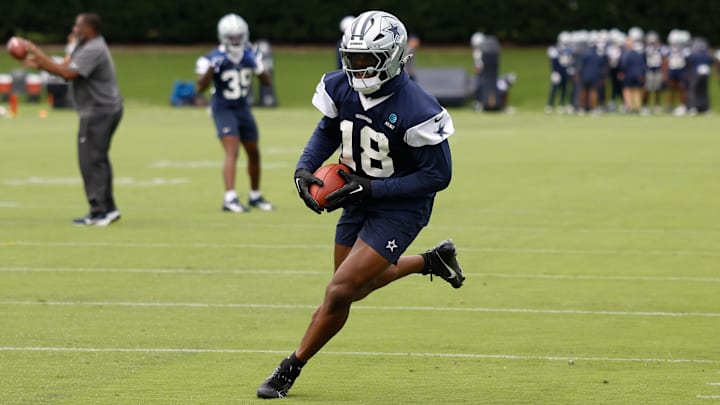 Dallas Cowboys linebacker Damone Clark goes through a drill during practice.