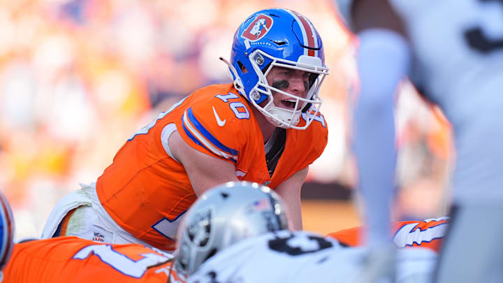Oct 6, 2024; Denver, Colorado, USA; Denver Broncos quarterback Bo Nix (10) during the fourth quarter against the Las Vegas Raiders at Empower Field at Mile High. Oct 6, 2024; Denver, Colorado, USA; Denver Broncos quarterback Bo Nix (10) during the fourth quarter against the Las Vegas Raiders at Empower Field at Mile High.