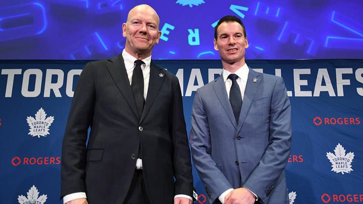 May 4, 2026; Toronto, Ontario, CANADA;  Toronto Maple Leafs new senior executive advisor Mats Sundin (l) and general manager John Chayka pose for picture after an introductory news conference at Real Sports Bar and Grill. Mandatory Credit: Dan Hamilton-Imagn Images