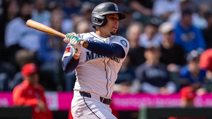 Seattle Mariners second baseman Leo Rivas hits a two-run single against the Los Angeles Angels on April 30 at T-Mobile Park. Seattle Mariners second baseman Leo Rivas hits a two-run single against the Los Angeles Angels on April 30 at T-Mobile Park.