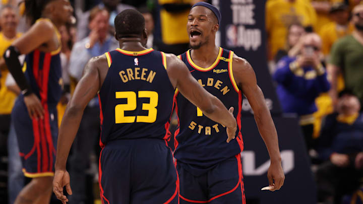 Apr 28, 2025; San Francisco, California, USA; Golden State Warriors forward Draymond Green (23) celebrates with forward Jimmy Butler III (10) after a play against the Houston Rockets during the fourth quarter of game four of the 2025 NBA Playoffs first round at Chase Center. Mandatory Credit: Kelley L Cox-Imagn Images