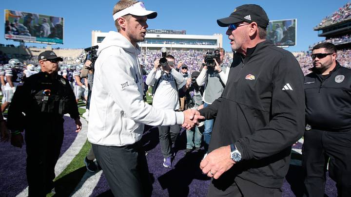 Kansas State Wildcats head coach Collin Klein shakes hands with Kansas Jayhawks head coach Lance Leipold following the Sunflower Showdown game at Bill Snyder Family Stadium in Manhattan, Kansas on Oct. 17, 2026. Kansas State Wildcats head coach Collin Klein shakes hands with Kansas Jayhawks head coach Lance Leipold following the Sunflower Showdown game at Bill Snyder Family Stadium in Manhattan, Kansas on Oct. 17, 2026.