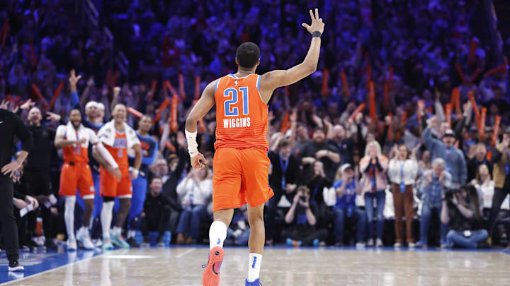 Jan 3, 2025; Oklahoma City, Oklahoma, USA; Oklahoma City Thunder guard Aaron Wiggins (21) celebrates after scoring against the New York Knicks during the second half at Paycom Center. Mandatory Credit: Alonzo Adams-Imagn Images