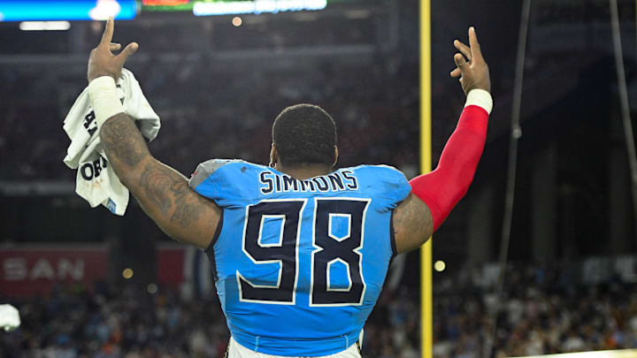 Aug 22, 2025; Nashville, Tennessee, USA;   Tennessee Titans defensive tackle Jeffery Simmons (98) celebrates against the Minnesota Vikings during the first half at Nissan Stadium. Mandatory Credit: Steve Roberts-Imagn Images