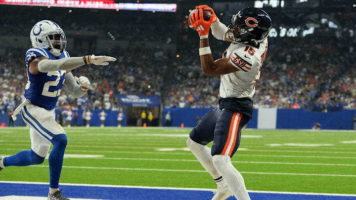 Former Husky Rome Odunze catches his first NFL touchdown pass in front of Indianapolis cornerback Kenny Moore II.