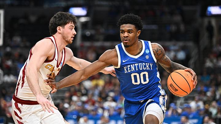 Mar 22, 2026; St. Louis, MO, USA; Kentucky Wildcats guard Otega Oweh (00) drives against Iowa State Cyclones guard Nate Heise (0) during the first half during a second round game of the men's 2026 NCAA Tournament at Enterprise Center. Mandatory Credit: Jeff Le-Imagn Images Mar 22, 2026; St. Louis, MO, USA; Kentucky Wildcats guard Otega Oweh (00) drives against Iowa State Cyclones guard Nate Heise (0) during the first half during a second round game of the men's 2026 NCAA Tournament at Enterprise Center. Mandatory Credit: Jeff Le-Imagn Images
