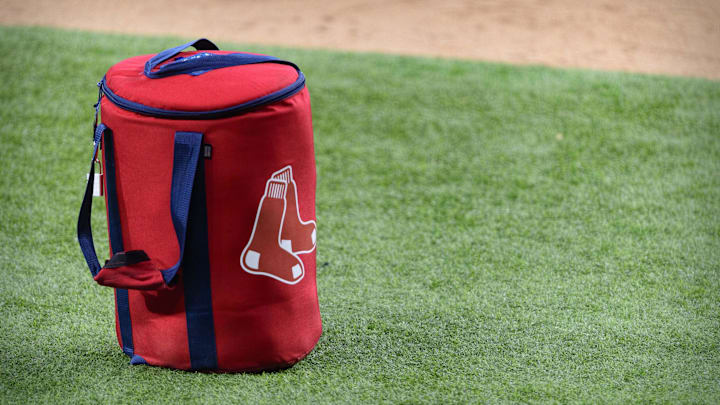 Apr 29, 2021; Arlington, Texas, USA; A view of the Boston Red Sox logo and a field bag during batting practice before the game between the Texas Rangers and the Boston Red Sox at Globe Life Field. Mandatory Credit: Jerome Miron-Imagn Images Apr 29, 2021; Arlington, Texas, USA; A view of the Boston Red Sox logo and a field bag during batting practice before the game between the Texas Rangers and the Boston Red Sox at Globe Life Field. Mandatory Credit: Jerome Miron-Imagn Images