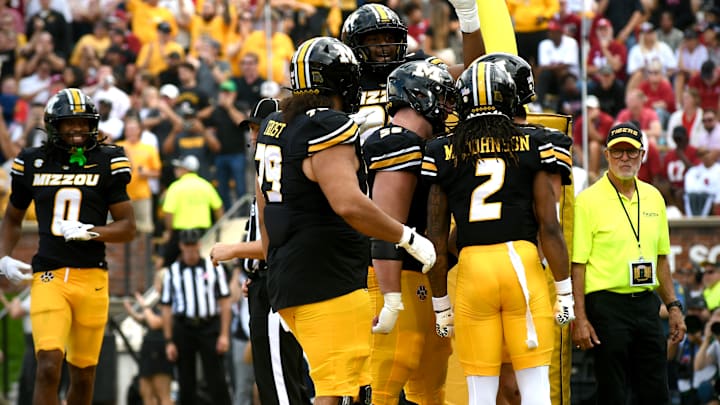 Oct 11, 2025; Columbia, MO, USA; The Missouri Tigers celebrate a touchdown in the third quarter against the Alabama Crimson Tide at Faurot Field at Memorial Stadium. 