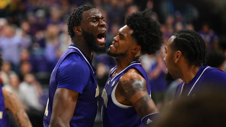  Huskies center Franck Kepnang and forward Keion Brooks Jr. celebrate beating Gonzaga a year ago. 