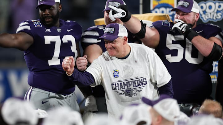 Dec 28, 2023; Orlando, FL, USA;  Kansas State Wildcats head coach Chris Klieman celebrates after winning the Pop-tarts bowl over NC State.