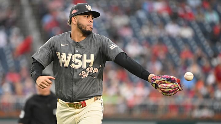 Sep 29, 2024; Washington, District of Columbia, USA; Washington Nationals second baseman Luis Garcia Jr. (2) tosses the ball out of his glove against the Philadelphia Phillies during the eighth inning at Nationals Park. Sep 29, 2024; Washington, District of Columbia, USA; Washington Nationals second baseman Luis Garcia Jr. (2) tosses the ball out of his glove against the Philadelphia Phillies during the eighth inning at Nationals Park.