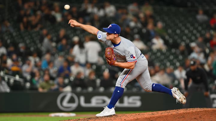 Sep 12, 2024; Seattle, Washington, USA; Texas Rangers relief pitcher David Robertson (37) pitches to the Seattle Mariners during the eighth inning at T-Mobile Park. Mandatory Credit: Steven Bisig-Imagn Images