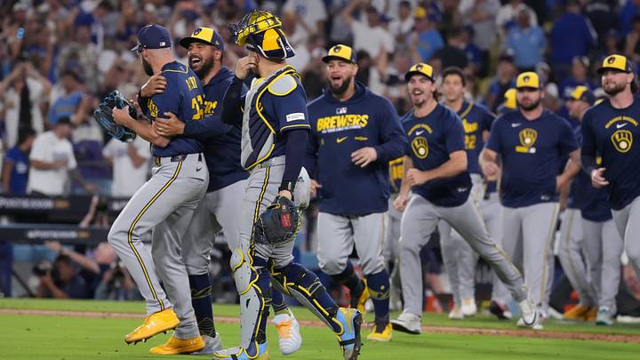 Oct 15, 2026; Los Angeles, California, USA; Milwaukee Brewers players celebrate after winning the NLCS for the 2026 MLB Playoffs against the Los Angeles Dodgers at Uniqlo Field at Dodger Stadium. Mandatory Credit: Kirby Lee-Imagn Images Oct 15, 2026; Los Angeles, California, USA; Milwaukee Brewers players celebrate after winning the NLCS for the 2026 MLB Playoffs against the Los Angeles Dodgers at Uniqlo Field at Dodger Stadium. Mandatory Credit: Kirby Lee-Imagn Images
