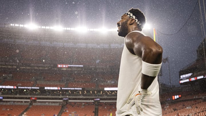 Aug 11, 2023; Cleveland, Ohio, USA; Cleveland Browns defensive end Myles Garrett (95) stands in the rain before the game against the Washington Commanders which was delayed due to severe weather at Cleveland Browns Stadium. Mandatory Credit: Scott Galvin-Imagn Images Aug 11, 2023; Cleveland, Ohio, USA; Cleveland Browns defensive end Myles Garrett (95) stands in the rain before the game against the Washington Commanders which was delayed due to severe weather at Cleveland Browns Stadium. Mandatory Credit: Scott Galvin-Imagn Images