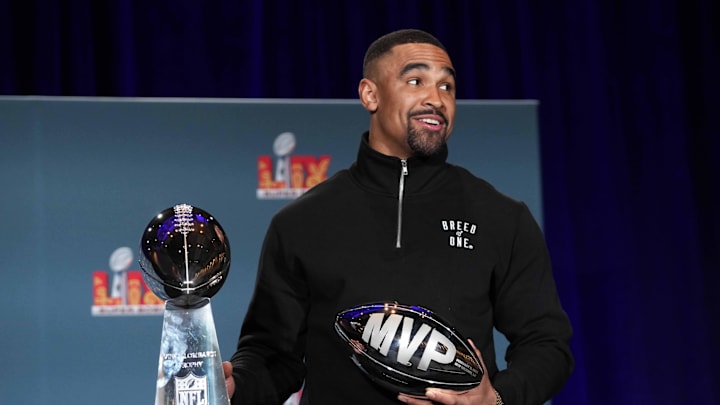Philadelphia Eagles quarterback Jalen Hurts (1) poses with the Vince Lombardi trophy.