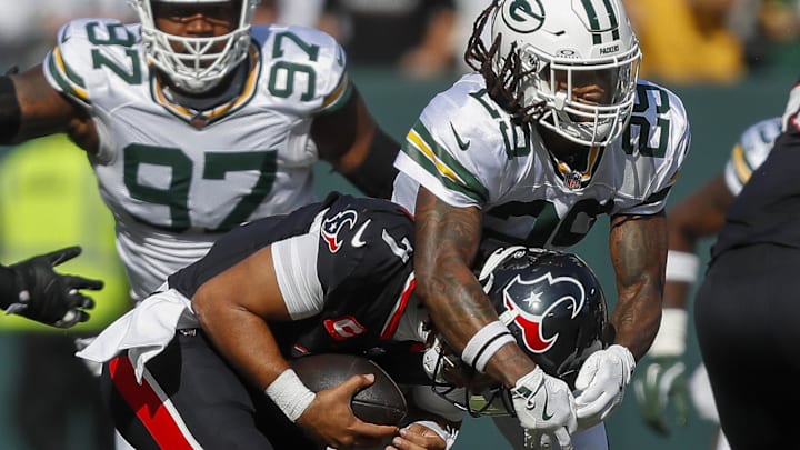 Green Bay Packers safety Xavier McKinney (29) sacks Houston Texans quarterback C.J. Stroud (7) at Lambeau Field. Green Bay Packers safety Xavier McKinney (29) sacks Houston Texans quarterback C.J. Stroud (7) at Lambeau Field.
