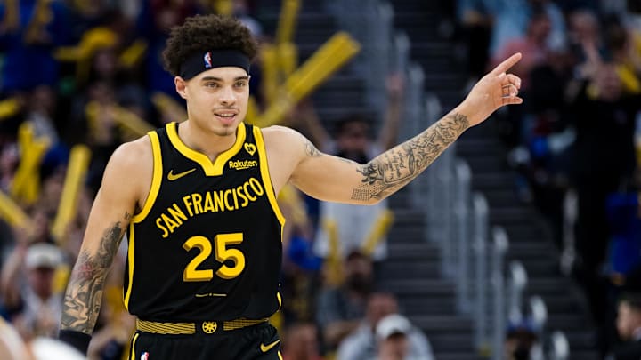 Feb 10, 2024; San Francisco, California, USA; Golden State Warriors guard Lester Quinones (25) gestures after hitting a three-point shot against the Phoenix Suns during the second half at Chase Center. Mandatory Credit: John Hefti-Imagn Images