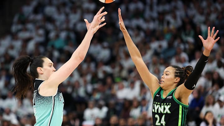 Oct 16, 2024; Minneapolis, Minnesota, USA; New York Liberty forward Breanna Stewart (30) shoots as Minnesota Lynx forward Napheesa Collier (24) defends during the second half of game three of the 2024 WNBA Finals at Target Center. Mandatory Credit: Matt Krohn-Imagn Images Oct 16, 2024; Minneapolis, Minnesota, USA; New York Liberty forward Breanna Stewart (30) shoots as Minnesota Lynx forward Napheesa Collier (24) defends during the second half of game three of the 2024 WNBA Finals at Target Center. Mandatory Credit: Matt Krohn-Imagn Images
