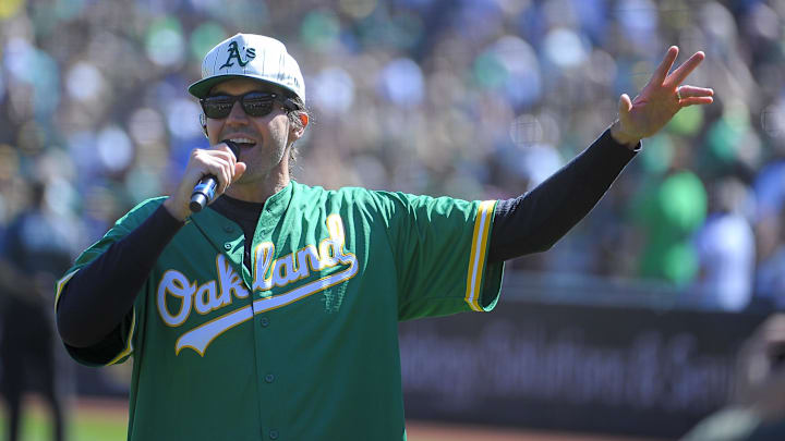 Sep 26, 2024; Oakland, California, USA; Oakland Athletics former pitcher Barry Zito sings the National Anthem before the game against the Texas Rangers at Oakland-Alameda County Coliseum. Mandatory Credit: Ed Szczepanski-Imagn Images Sep 26, 2024; Oakland, California, USA; Oakland Athletics former pitcher Barry Zito sings the National Anthem before the game against the Texas Rangers at Oakland-Alameda County Coliseum. Mandatory Credit: Ed Szczepanski-Imagn Images