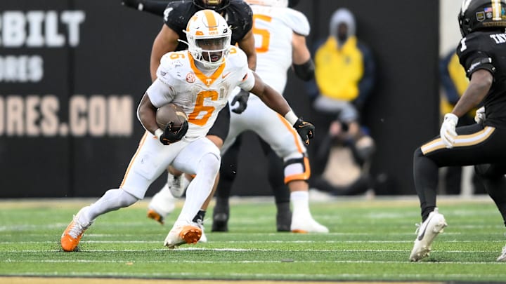 Nov 30, 2024; Nashville, Tennessee, USA;  Tennessee Volunteers running back Dylan Sampson (6) runs the ball against the Vanderbilt Commodores during the second half at FirstBank Stadium. Mandatory Credit: Steve Roberts-Imagn Images