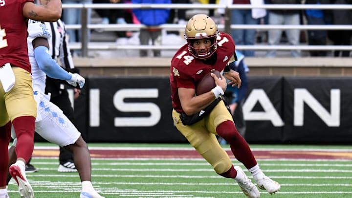 Nov 23, 2024; Chestnut Hill, Massachusetts, USA; Boston College Eagles quarterback Grayson James (14) runs the ball against the North Carolina Tar Heels during the first half at Alumni Stadium. Mandatory Credit: Eric Canha-Imagn Images Nov 23, 2024; Chestnut Hill, Massachusetts, USA; Boston College Eagles quarterback Grayson James (14) runs the ball against the North Carolina Tar Heels during the first half at Alumni Stadium. Mandatory Credit: Eric Canha-Imagn Images