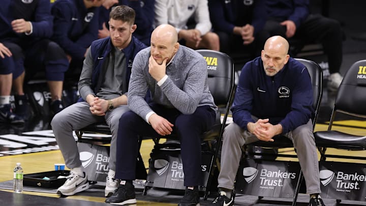 Penn State Nittany Lions head coach Cael Sanderson watches his team wrestle the Iowa Hawkeyes at Carver-Hawkeye Arena. 