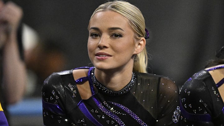 LSU Tigers gymnast Livvy Dunne cheers for the LSU gymnastic team during the 2025 Women's National Gymnastics Semifinal at Dickies Arena. 