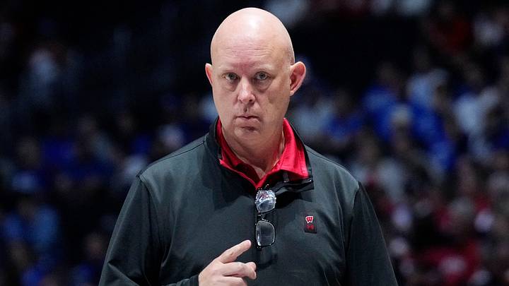 Wisconsin Badgers head coach Kelly Sheffield signals to a player during the first set of their match against the Kentucky Wildcats at the AVCA First Serve event at Fiserv Forum in Milwaukee, Wisconsin on Aug. 21, 2026.