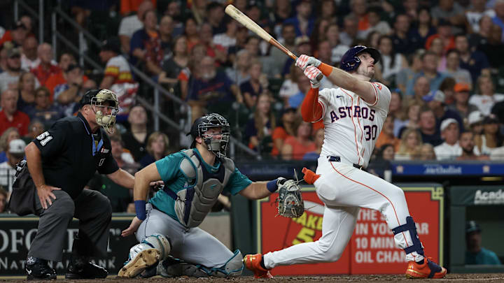 Sep 24, 2024; Houston, Texas, USA;  Houston Astros right fielder Kyle Tucker (30) hits a home run against the Seattle Mariners in the fourth inning at Minute Maid Park.