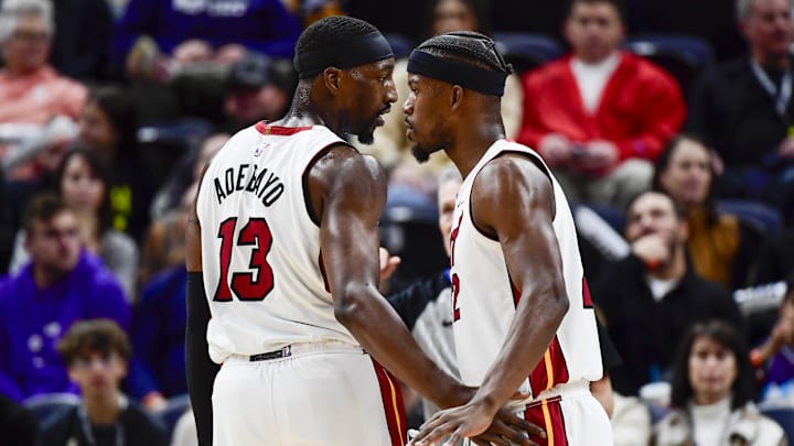 Dec 31, 2022; Salt Lake City, Utah, USA; Miami Heat forward Jimmy Butler (22) and center/forward Bam Adebayo (13) talk before a free-throw shot against the Utah Jazz during the second half at Vivint Arena. Mandatory Credit: Christopher Creveling-Imagn Images Dec 31, 2022; Salt Lake City, Utah, USA; Miami Heat forward Jimmy Butler (22) and center/forward Bam Adebayo (13) talk before a free-throw shot against the Utah Jazz during the second half at Vivint Arena. Mandatory Credit: Christopher Creveling-Imagn Images