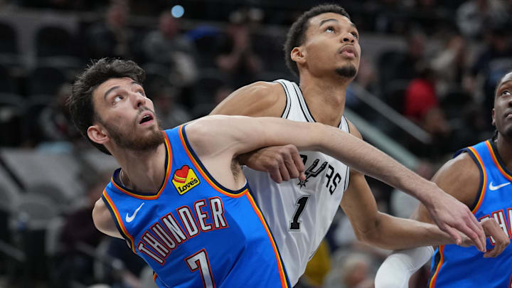 Feb 29, 2024; San Antonio, Texas, USA; Oklahoma City Thunder forward Chet Holmgren (7) and San Antonio Spurs center Victor Wembanyama (1) battle for position in the first half at Frost Bank Center. Mandatory Credit: Daniel Dunn-Imagn Images Feb 29, 2024; San Antonio, Texas, USA; Oklahoma City Thunder forward Chet Holmgren (7) and San Antonio Spurs center Victor Wembanyama (1) battle for position in the first half at Frost Bank Center. Mandatory Credit: Daniel Dunn-Imagn Images