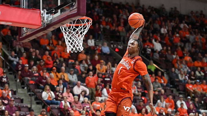 Feb 21, 2026; Blacksburg, Va.; Virginia Tech forward Tobi Lawal (1) goes up for a dunk against Wake Forest.