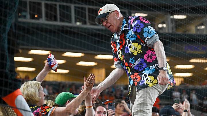 Jun 29, 2024; Baltimore, Maryland, USA; Baltimore Orioles owner David Rubenstein high fives fans during the seventh inning stretch against the Texas Rangers at Oriole Park at Camden Yards. Mandatory Credit: Tommy Gilligan-USA TODAY Sports Jun 29, 2024; Baltimore, Maryland, USA; Baltimore Orioles owner David Rubenstein high fives fans during the seventh inning stretch against the Texas Rangers at Oriole Park at Camden Yards. Mandatory Credit: Tommy Gilligan-USA TODAY Sports