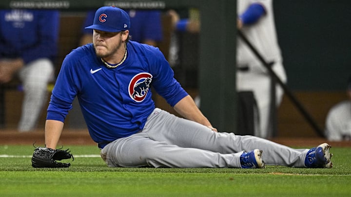 Chicago Cubs starting pitcher Justin Steele (35) grabs his leg