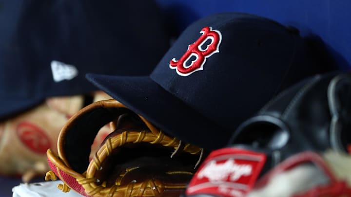 Sep 20, 2019; St. Petersburg, FL, USA; A detail view of Boston Red Sox hats and gloves at Tropicana Field. Mandatory Credit: Kim Klement-Imagn Images Sep 20, 2019; St. Petersburg, FL, USA; A detail view of Boston Red Sox hats and gloves at Tropicana Field. Mandatory Credit: Kim Klement-Imagn Images